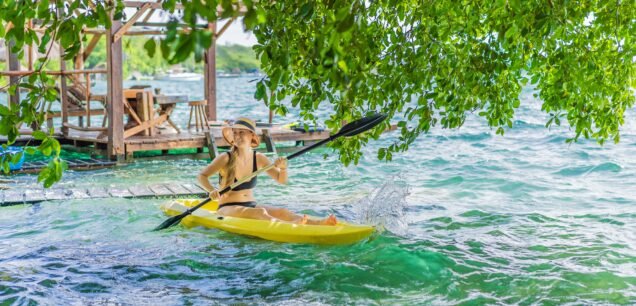 Woman,Kayaking,On,Bacalar,Lake,In,Mexico.,Adventure,Tourism,In