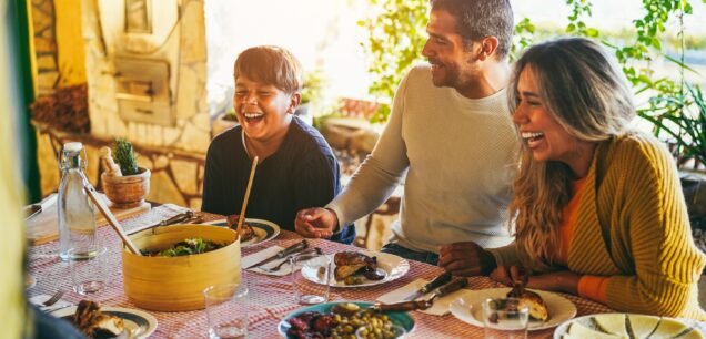 Happy,Latin,Family,Having,Fun,Eating,Together,During,Home,Dinner